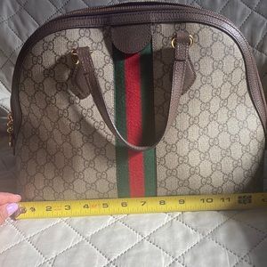 Authentic Gucci handbag (slightly used) still in good condition.